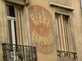  ancienne publicié pour une bière peinte sur le mur d'un immeuble